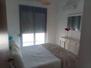 Posteľ alebo postele v izbe v ubytovaní Villa Poseidon Blue