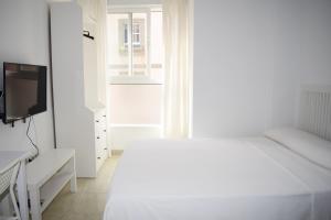 Posteľ alebo postele v izbe v ubytovaní Hotel Mirablau