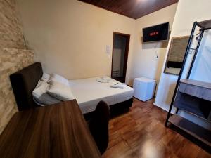 Postel nebo postele na pokoji v ubytování Hotel Serra do Mar