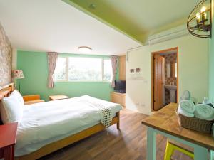 Postel nebo postele na pokoji v ubytování Hejia B&B