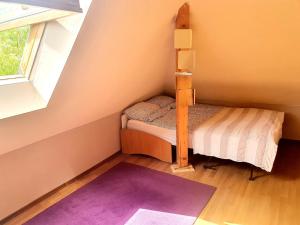 Łóżko lub łóżka w pokoju w obiekcie Akacjowa 7