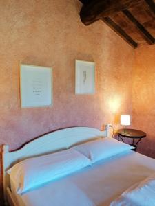 Posteľ alebo postele v izbe v ubytovaní Agriturismo Monte Gusciani