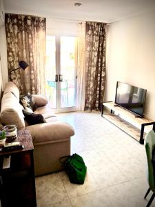 Posedenie v ubytovaní Apartamento Calipso Plus