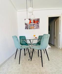Posedenie v ubytovaní Apartamento Calipso Plus