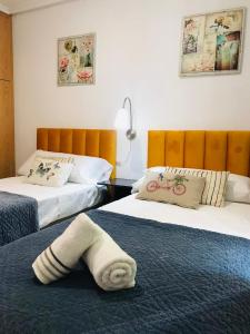 Posteľ alebo postele v izbe v ubytovaní Apartamento Calipso Plus