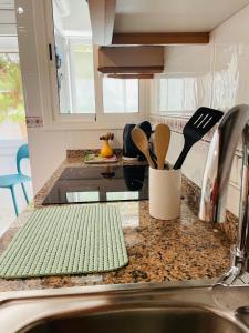 Kuchyňa alebo kuchynka v ubytovaní Apartamento Calipso Plus