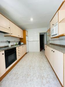 Kuchyňa alebo kuchynka v ubytovaní Apartamento Calipso Plus