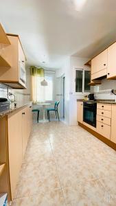 Kuchyňa alebo kuchynka v ubytovaní Apartamento Calipso Plus