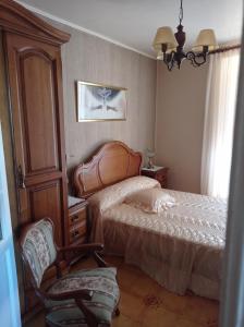 Posteľ alebo postele v izbe v ubytovaní CASA DO RIZAL