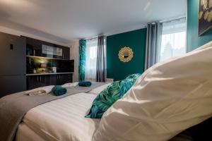 Posteľ alebo postele v izbe v ubytovaní Eromeni Apartments