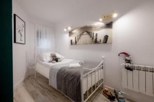 Posteľ alebo postele v izbe v ubytovaní Eromeni Apartments