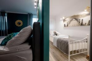 Posteľ alebo postele v izbe v ubytovaní Eromeni Apartments