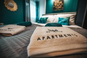 Posteľ alebo postele v izbe v ubytovaní Eromeni Apartments