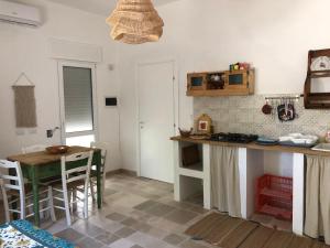 Kuchyň nebo kuchyňský kout v ubytování FICOMORO surf house