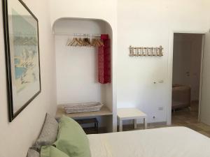 Postel nebo postele na pokoji v ubytování FICOMORO surf house