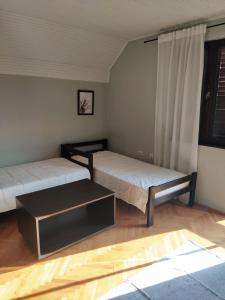 Postel nebo postele na pokoji v ubytování Drinski pogled
