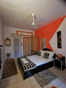 En eller flere senge i et værelse på La Maison de Canelya