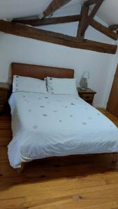 Postel nebo postele na pokoji v ubytování NATURA SERENA CHAMBRE BED AND BREAKFAST