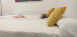 Łóżko lub łóżka w pokoju w obiekcie Apartamento Romero Garden B