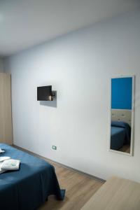 A bed or beds in a room at Villa Street Art