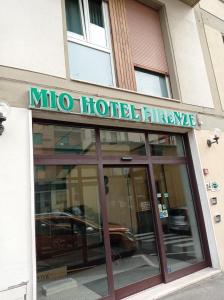 a building with a sign that reads micro hotel therapy at Mio Hotel Firenze in Florence