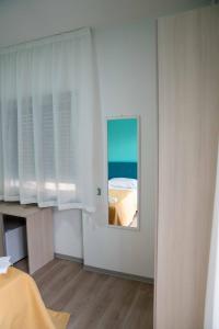 A bed or beds in a room at Villa Street Art