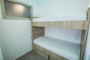 Postel nebo postele na pokoji v ubytování Ialemos Group