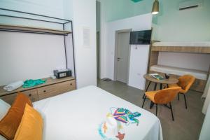 Postel nebo postele na pokoji v ubytování Ialemos Group