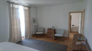 Postel nebo postele na pokoji v ubytování Comptoir d aubrac
