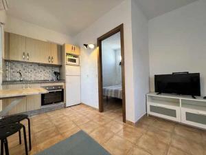 Kuchyň nebo kuchyňský kout v ubytování Casita apartamento a 150m de la playa 2 personas + 2 fotografie