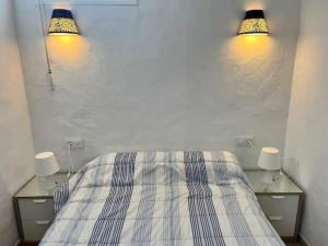 Postel nebo postele na pokoji v ubytování Casita apartamento a 150m de la playa 2 personas