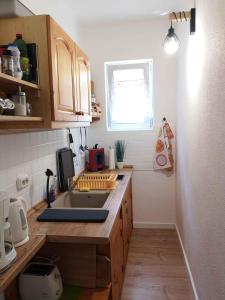 A kitchen or kitchenette at Holiday home in Balatonfenyves 27939