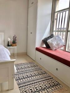 Ліжко або ліжка в номері Al Majdiah Residence الماجدية ريزدينس شقة عائلية متكاملة