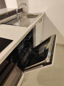 A kitchen or kitchenette at Fantasia B&B APARTAMENT STUDIO