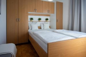 Posteľ alebo postele v izbe v ubytovaní MiaLu