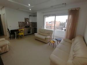 Ruang duduk di S+2 climatisé vue mer