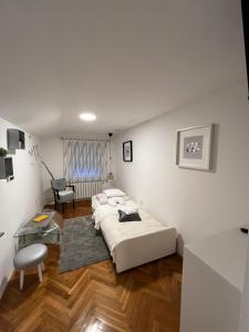 En eller flere senger på et rom på Apartments Krapinske Toplice Krtak Biba