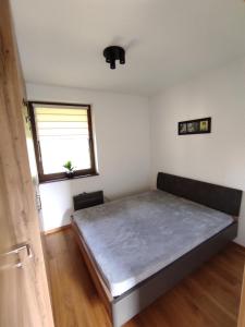 Voodi või voodid majutusasutuse Apartment Secret Nest toas