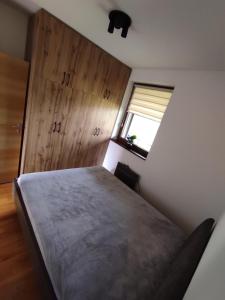 Voodi või voodid majutusasutuse Apartment Secret Nest toas