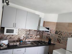 Kuchyňa alebo kuchynka v ubytovaní Terraza Alcalá