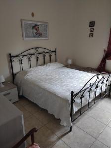 Postel nebo postele na pokoji v ubytování Casa di Grazia