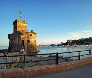 a building next to a body of water at Casa di Clara in Rapallo