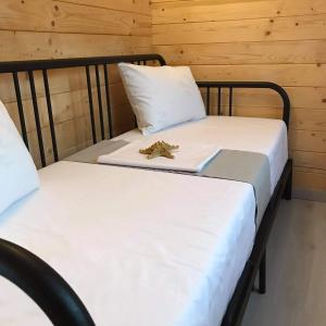 Posteľ alebo postele v izbe v ubytovaní Fillip wooden house