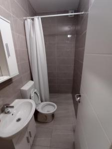 Kúpeľňa v ubytovaní Damjan Rooms