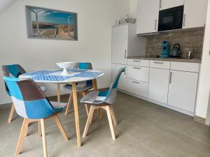 Kuchyň nebo kuchyňský kout v ubytování Ferienwohnung Lieblingsplatz-Greetsiel