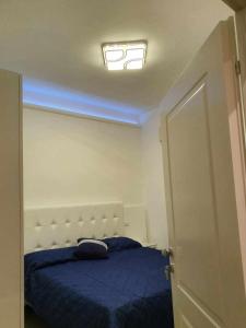 A bed or beds in a room at Fantasia B&B APARTAMENT STUDIO