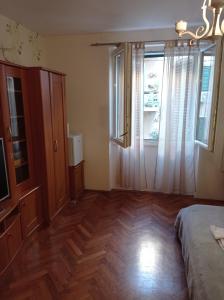 Posteľ alebo postele v izbe v ubytovaní Damjan Rooms