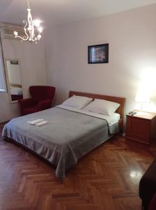 Posteľ alebo postele v izbe v ubytovaní Damjan Rooms