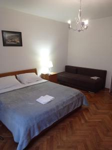 Кровать или кровати в номере Damjan Rooms