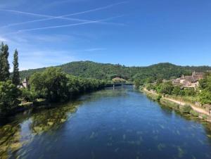 a view of a river from a bridge at Classic House in Argentat